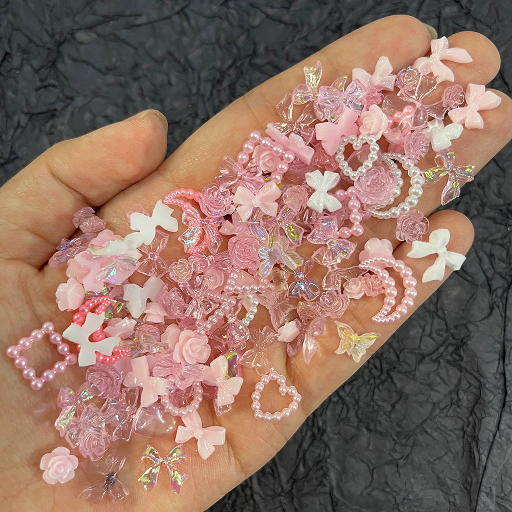 50Pcs Pearl Pink Bowknot Heart Shaped Rhinestones Mixed Nail Decorations Kawaii Flowers Butterfly Charms DIY Nail Accessories