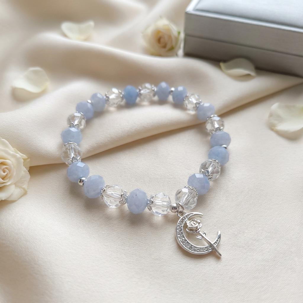 Aquamarine bracelet with moon charm