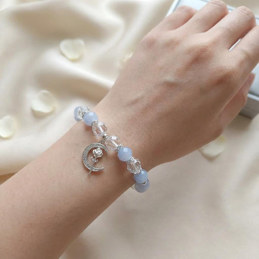 Aquamarine bracelet with moon charm